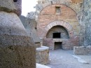 Oven and grinding wheels * The bakery with the oven and several grinding wheels for grinding the wheat. * 432 x 323 * (62KB)